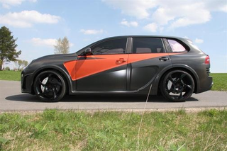 Illustration for article titled Mansory Chopster: Carbon Fiber Cayenne Crazy-Time